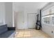 Bright, empty room with a large window and an exercise machine, showcasing potential use as a bedroom at 6027 Bayside Key Dr, Tampa, FL 33615