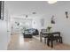 Open-concept living space with natural light, dining area, and cozy seating arrangement at 6027 Bayside Key Dr, Tampa, FL 33615