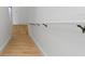 Clean staircase with hardwood treads and white risers leading to upper level at 6027 Bayside Key Dr, Tampa, FL 33615