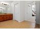 Bright bathroom with granite vanity and tile flooring at 6413 Emerson Rd, Brooksville, FL 34601