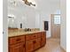 Bathroom with granite vanity and tiled floors and shower at 6413 Emerson Rd, Brooksville, FL 34601