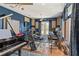 The house includes a music room with drum kit, piano, guitars and sound proofing for creative expression at 6413 Emerson Rd, Brooksville, FL 34601
