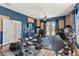 Spacious music room featuring a drum kit, guitars, and soundproofing for a creative space at 6413 Emerson Rd, Brooksville, FL 34601