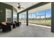 Enjoy this screened-in patio overlooking the large yard and tranquil scenery at 6413 Emerson Rd, Brooksville, FL 34601