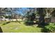 This spacious backyard features a storage shed at 6825 Main St, New Port Richey, FL 34653