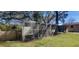 This backyard features a chicken coop at 6825 Main St, New Port Richey, FL 34653