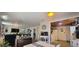 Spacious open-concept living area flows into the kitchen, offering great natural light and a welcoming atmosphere at 6825 Main St, New Port Richey, FL 34653