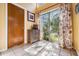 Entryway boasts tile flooring, natural light, and classic design at 7065 Red Oak Loop, New Port Richey, FL 34654