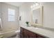 Bright bathroom featuring granite countertops, neutral walls and updated fixtures at 7216 Julian St, New Port Richey, FL 34653