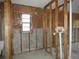 View of bathroom showing exposed walls and plumbing, ready for renovation at 7308 Mako Dr, Hudson, FL 34667