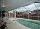 Screened in in-ground swimming pool perfect for relaxation at 7308 Mako Dr, Hudson, FL 34667
