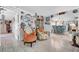 Sitting area with two accent chairs, tile floors, and stylish home decor at 7353 Banner St, New Port Richey, FL 34653