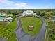 Beautifully landscaped view of the community clubhouse, showcasing its well-maintained exterior and surrounding greenery at 8910 Jericho Rd, Weeki Wachee, FL 34613