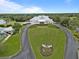 Beautifully landscaped view of the community clubhouse, showcasing its well-maintained exterior and surrounding greenery at 8910 Jericho Rd, Weeki Wachee, FL 34613