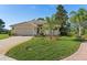 Charming single-story home with a well-manicured lawn and inviting curb appeal at 8910 Jericho Rd, Weeki Wachee, FL 34613