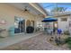 Spacious screened patio with seating and views of the backyard, ideal for outdoor living and entertaining at 8910 Jericho Rd, Weeki Wachee, FL 34613