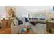 Spacious living room featuring comfortable seating, stylish decor, and natural light at 1002 Caravel Ct, Tarpon Springs, FL 34689
