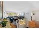 Open living room with lots of natural light and comfortable seating at 1002 Caravel Ct, Tarpon Springs, FL 34689