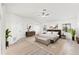Spacious bedroom featuring ample natural light, neutral decor and a ceiling fan at 1011 Altoona Ave, Spring Hill, FL 34609