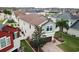 Two-story home with a brick driveway, two-car garage, manicured lawn and landscaping at 11611 Lake Blvd, New Port Richey, FL 34655