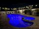 Beautiful pool and spa area with brick pavers and relaxing lounge chairs at night at 11611 Lake Blvd, New Port Richey, FL 34655