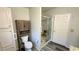 Well-organized bathroom featuring new wood-look floors and walk-in shower at 11641 Quincy Dr # 141, New Port Richey, FL 34654