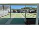 Community shuffleboard court under a covered pavilion, offering recreational opportunities for residents at 11641 Quincy Dr # 141, New Port Richey, FL 34654