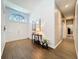 Bright foyer featuring wood floors, high ceilings, and neutral decor at 13217 Jessica Dr, Spring Hill, FL 34609