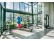 Bright gym featuring stationary bikes, medicine balls, and floor-to-ceiling windows at 15384 Caravan Ave, Odessa, FL 33556
