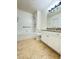This bathroom features tile flooring, a granite countertop, and a shower-tub combination at 19325 Water Oak Dr # 205, Port Charlotte, FL 33948