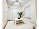Bright bedroom features a ceiling fan, large closets, and neutral walls at 19325 Water Oak Dr # 205, Port Charlotte, FL 33948