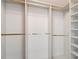 Walk in closet with built-in shelving and ample storage space at 2764 Countryside Blvd # 3, Clearwater, FL 33761
