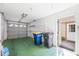 Spacious two car garage with overhead door and access to the front of the home at 2764 Countryside Blvd # 3, Clearwater, FL 33761