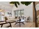 Modern living room showcases contemporary furniture, natural light, and stylish decor at 28752 Falling Leaves Way, Wesley Chapel, FL 33543