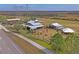 Expansive commercial property with multiple buildings, outdoor seating, and recreational areas at 3130 Forsythia Dr, Odessa, FL 33556