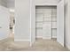 Well-organized closet with custom shelving and drawers in a bright, neutral space at 3130 Forsythia Dr, Odessa, FL 33556