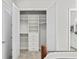 Spacious closet featuring custom shelving and drawers for optimal organization at 3130 Forsythia Dr, Odessa, FL 33556