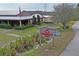 Quaint country store featuring rustic design, charming outdoor seating, and inviting signage at 3130 Forsythia Dr, Odessa, FL 33556