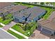 Aesthetic single-Gathering home with tile roof and lush landscaping, nestled in a well-planned community with convenient street access at 3130 Forsythia Dr, Odessa, FL 33556