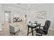 Bright office space with neutral colors, elegant furniture, and wood-look floors at 3130 Forsythia Dr, Odessa, FL 33556