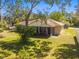 The home boasts a large backyard that is ideal for outdoor entertaining and gardening at 3273 Bluestone Ave, Spring Hill, FL 34609