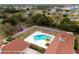 Community pool, playground and amenity center from an aerial perspective at 3542 Conifer Loop, Spring Hill, FL 34609