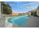 Sparkling in-ground pool with screened enclosure, perfect for outdoor relaxation and entertainment at 3542 Conifer Loop, Spring Hill, FL 34609