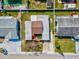 Aerial view showcasing the house layout, surrounding neighborhood, and backyard at 3730 Sail Dr, New Port Richey, FL 34652