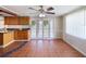 Eat in kitchen area with tiled floors, oak cabinets, and views of outdoor patio at 3730 Sail Dr, New Port Richey, FL 34652