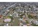 Wide aerial view of residential area with waterfront homes, private pools, and boat docks at 4048 Orient Dr, Hernando Beach, FL 34607
