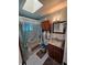 Bathroom featuring a single sink vanity, toilet and shower at 4048 Orient Dr, Hernando Beach, FL 34607