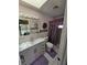Cozy bathroom featuring a single sink vanity, toilet and shower at 4048 Orient Dr, Hernando Beach, FL 34607