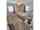 Bedroom featuring tiled floor with a bed and a desk at 4048 Orient Dr, Hernando Beach, FL 34607