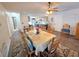 Cozy dining room with wood furniture, open layout, and lots of light at 4048 Orient Dr, Hernando Beach, FL 34607